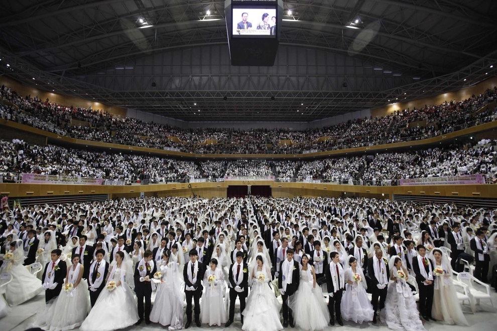 Thousands of Unification Church members, known as "Moonies," got married in a mass wedding in South Korea Sunday &mdash; the first since the death of controversial church founder Sun Myung Moon.