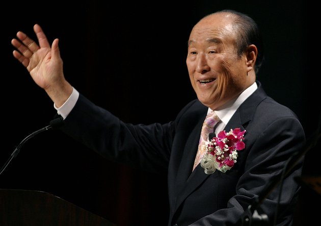 Unification Church leader Rev. Sun Myung Moon speaks during his "Now is God's Time" rally in New York, Saturday, June 25, 2005. Billy Graham is also hosting a religious event in New York this weekend. (AP Photo/John Marshall Mantel)