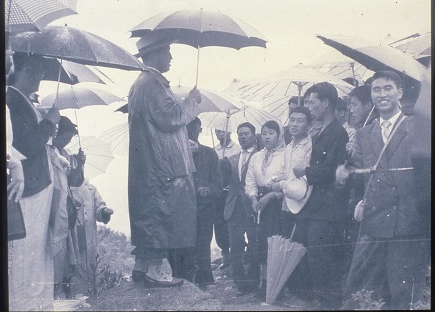 The Rev. Sun Myung Moon with disciples. Courtesy H.S.A.-U.W.C.