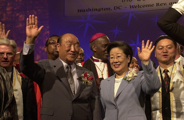 Rev. Sun Myung Moon and his wife, Hak Ja Han Moon, are greeted April 16, 2001, by the clergy and worshipers at the We Will Stand 2001 National Tour, held at the Omni Shoreham Regency Hotel in D.C. The theme of the 52-day, 52-city tour was "Rebuild the Family, Restore the Community, Renew the Nation and the World." (Jessica Tefft/The Washington Times )